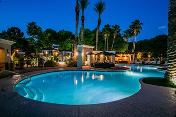 Refreshing lagoon style pool with private cabanas